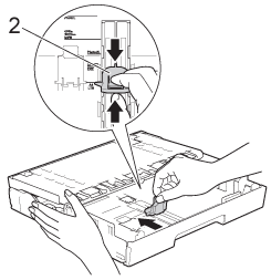 Adjust the paper length guide to fit the paper size